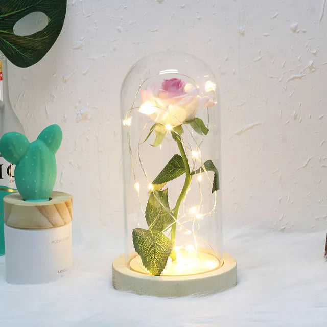 Tischlampe mit konservierter Rosenfigur
