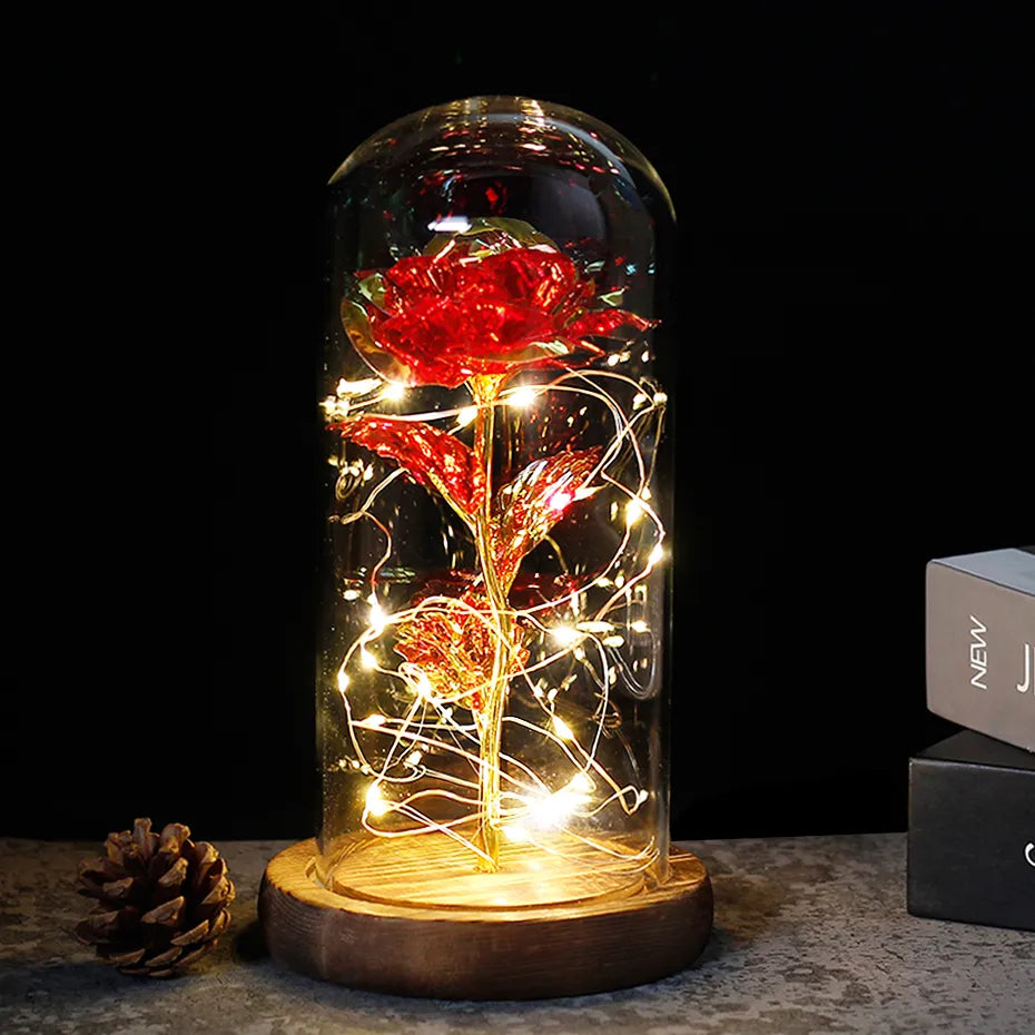 Tischlampe mit konservierter Rosenfigur