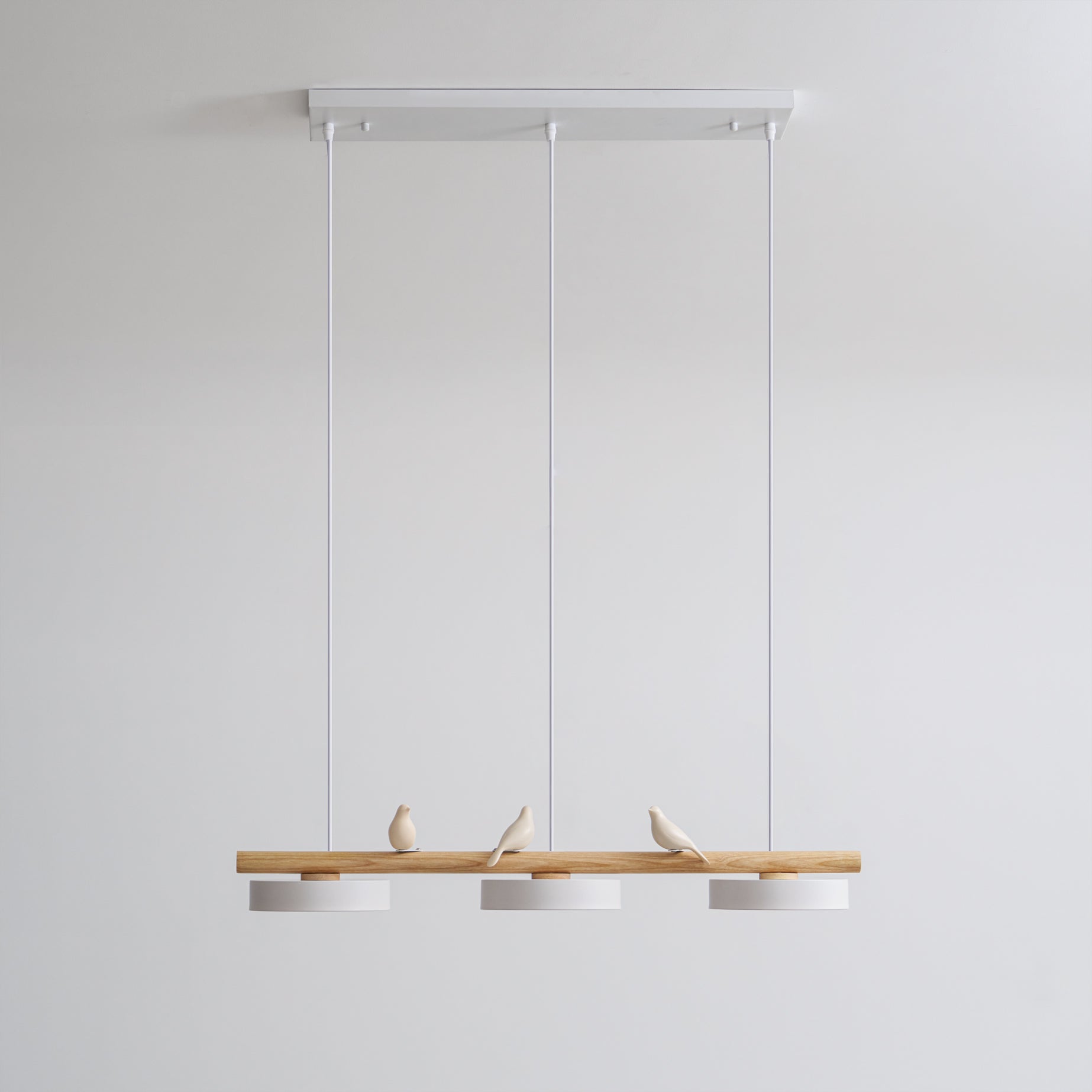 Parallelstrahler Pendelleuchte mit Vogelmotiven
