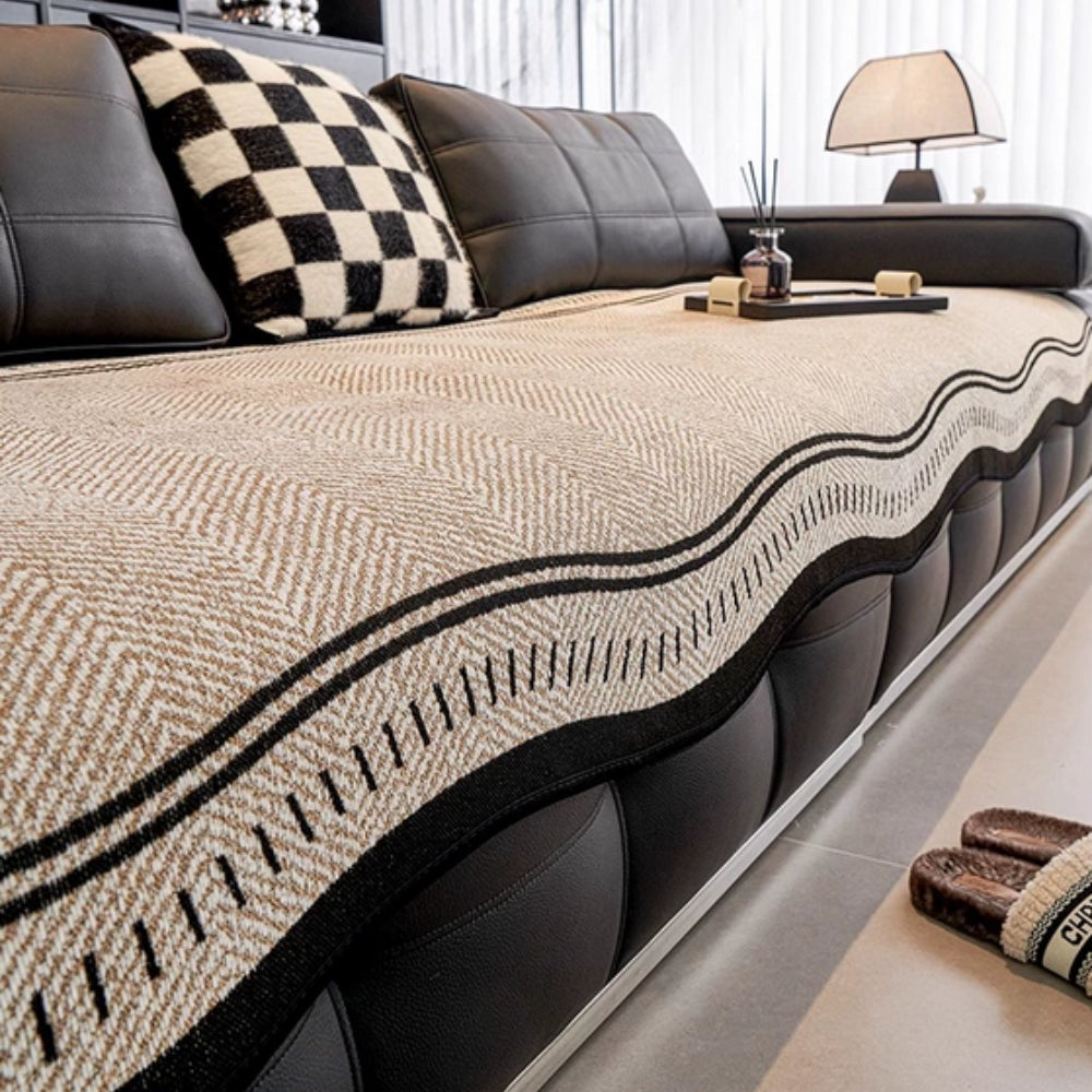 Sofaüberzug im Fischgrätenmuster