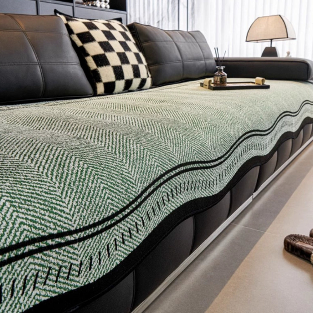 Sofaüberzug im Fischgrätenmuster