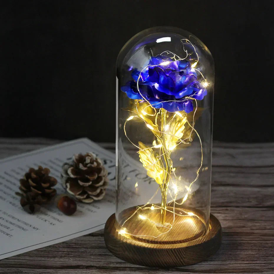 Tischlampe mit konservierter Rosenfigur