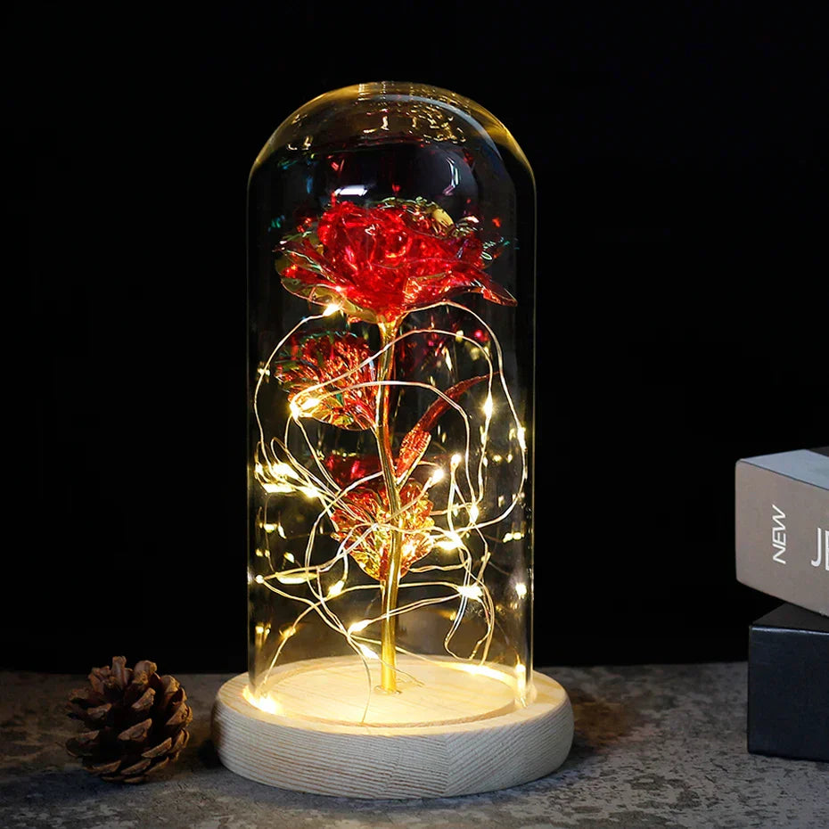 Tischlampe mit konservierter Rosenfigur