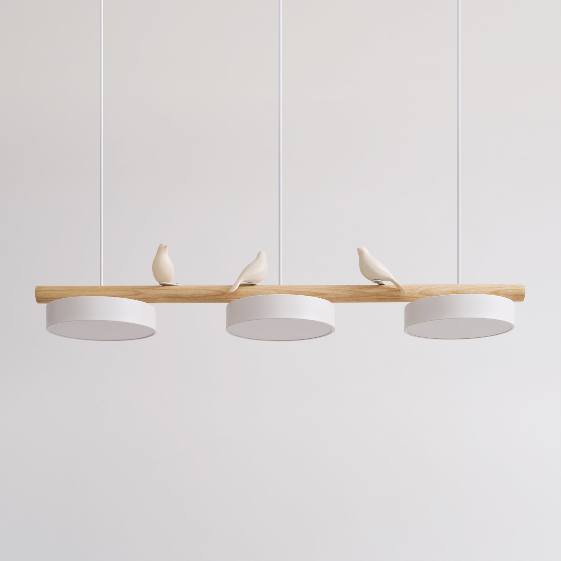Parallelstrahler Pendelleuchte mit Vogelmotiven