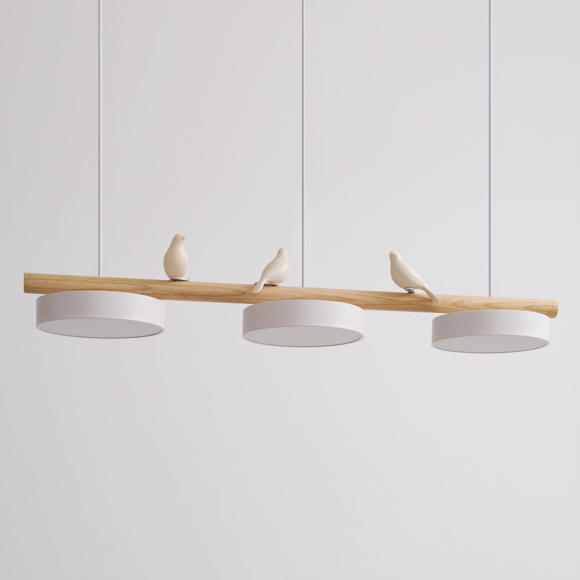 Parallelstrahler Pendelleuchte mit Vogelmotiven
